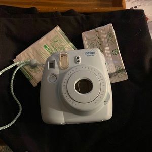 Light Blue Instax Mini 8 Camera w/ 2 extra film packs and case